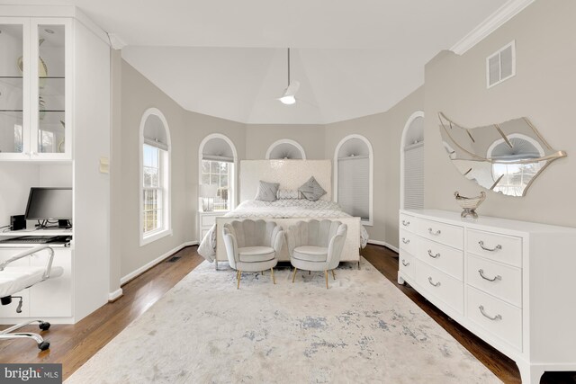 12436 Bacall Ln, Potomac, MD 20854 - bedroom with dark wood-type flooring, crown molding, baseboards, and vaulted ceiling