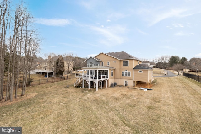 12436 Bacall Ln, Potomac, MD 20854 - back of property featuring a sunroom, stairway, stucco siding, a wooden deck, and driveway