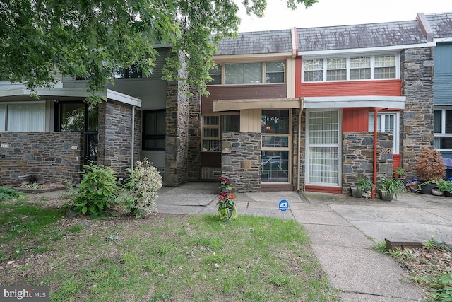 3852 Conshohocken Ave, Philadelphia, PA 19131 - view of front facade featuring stone siding