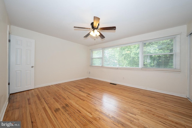 3852 Conshohocken Ave, Philadelphia, PA 19131 - empty room with light wood finished floors, ceiling fan, and baseboards