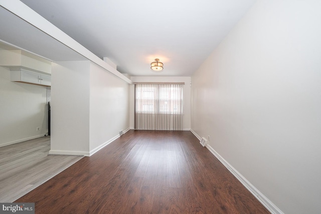 3852 Conshohocken Ave, Philadelphia, PA 19131 - empty room with wood finished floors and baseboards