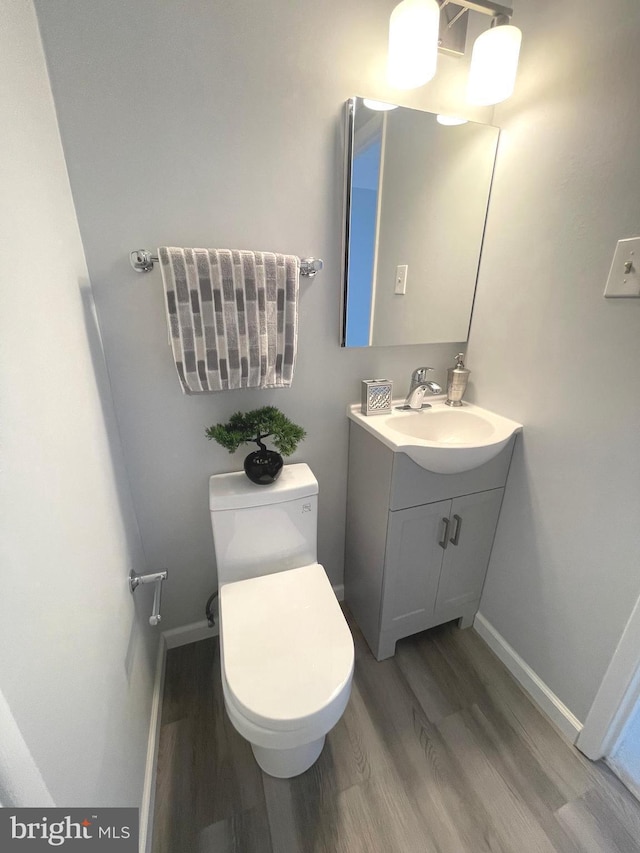3700 N Rosser St Unit 104, Alexandria, VA 22311 - bathroom featuring wood finished floors and vanity