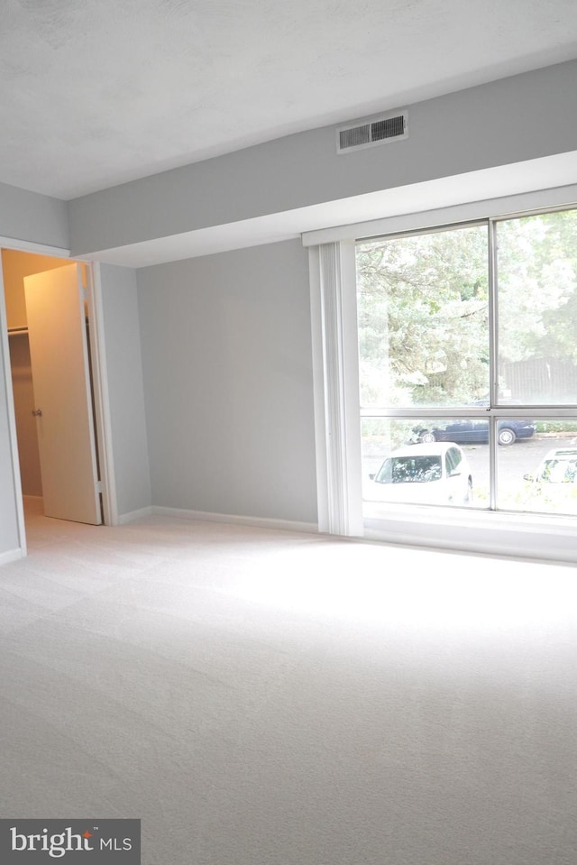 3700 N Rosser St Unit 104, Alexandria, VA 22311 - carpeted empty room with healthy amount of natural light