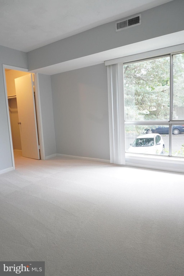 3700 N Rosser St Unit 104, Alexandria, VA 22311 - carpeted spare room with plenty of natural light