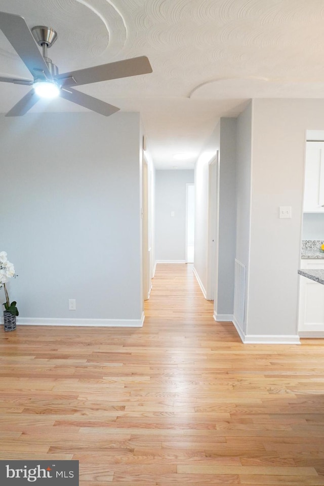 3700 N Rosser St Unit 104, Alexandria, VA 22311 - hallway with light wood-type flooring and baseboards