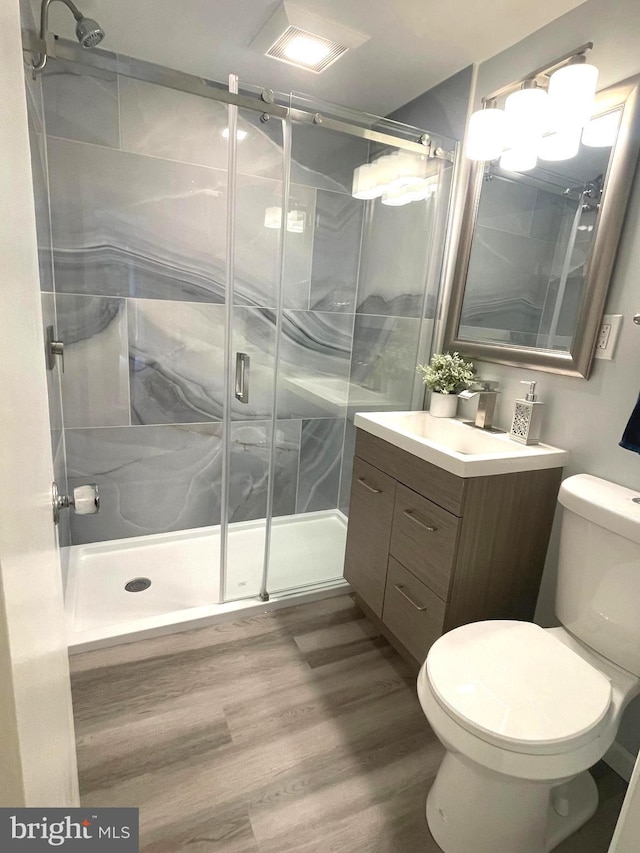 3700 N Rosser St Unit 104, Alexandria, VA 22311 - full bathroom with a shower stall, vanity, and wood finished floors
