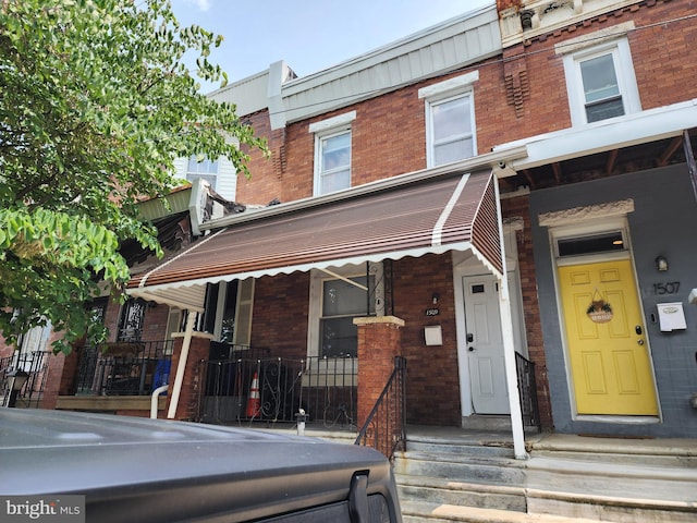 1509 N 30th St, Philadelphia, PA 19121 - multi unit property featuring brick siding and covered porch