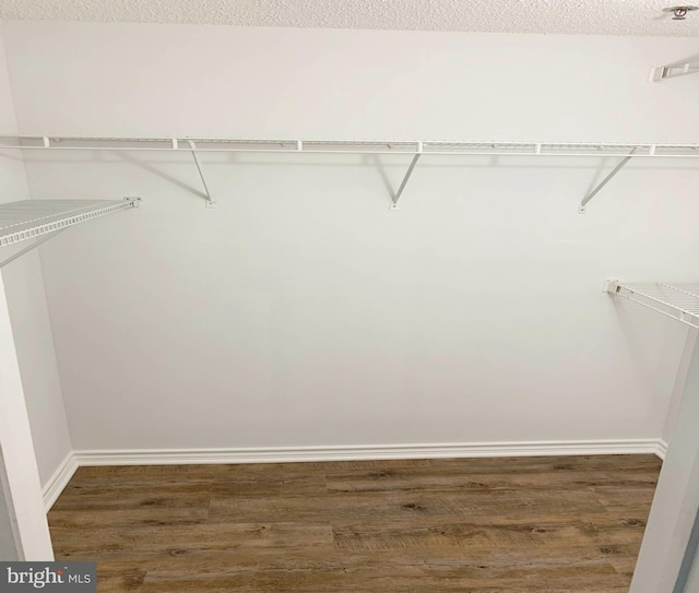 1504 Lincoln Way Unit 305, Mclean, VA 22102 - walk in closet featuring wood finished floors