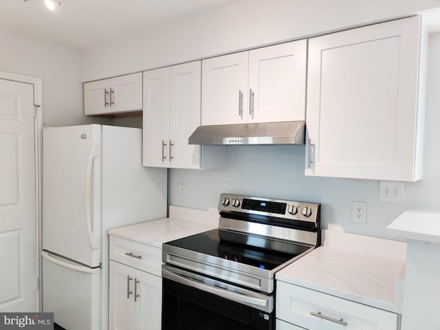 1504 Lincoln Way Unit 305, Mclean, VA 22102 - kitchen with under cabinet range hood, electric range, white cabinetry, and freestanding refrigerator