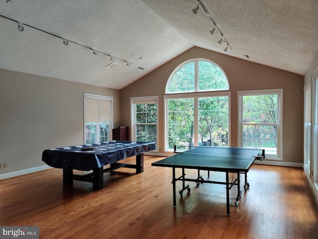 1504 Lincoln Way Unit 305, Mclean, VA 22102 - recreation room with track lighting, wood-type flooring, plenty of natural light, baseboards, and vaulted ceiling