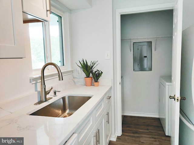 1504 Lincoln Way Unit 305, Mclean, VA 22102 - kitchen with electric panel, a sink, white cabinetry, and light stone countertops
