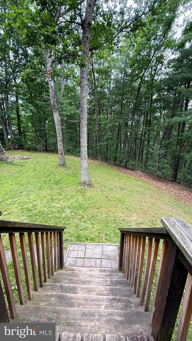 28 Myrtle Dr, Gerrardstown, WV 25420 - wooden deck featuring a yard