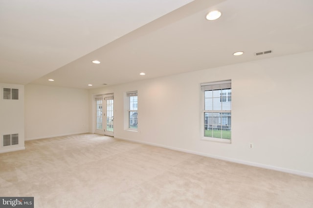 9573 5th Pl, Lorton, VA 22079 - empty room featuring recessed lighting, light colored carpet, and plenty of natural light