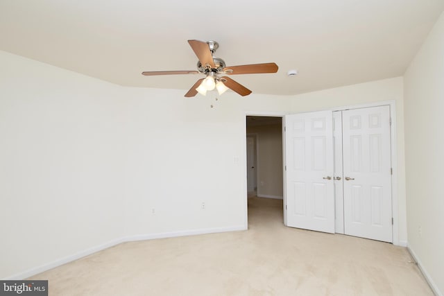 9573 5th Pl, Lorton, VA 22079 - unfurnished bedroom featuring light carpet, a closet, and ceiling fan