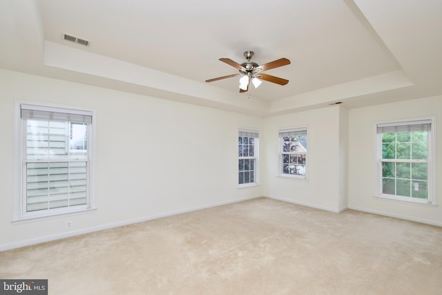 9573 5th Pl, Lorton, VA 22079 - spare room with a raised ceiling, ceiling fan, and light carpet