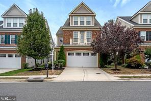 5968 Manorview Way, Alexandria, VA 22315 - view of front of house featuring a garage and concrete driveway