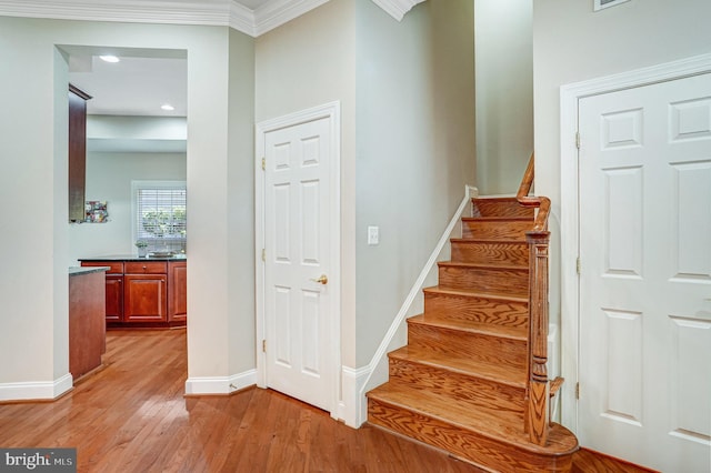 5968 Manorview Way, Alexandria, VA 22315 - stairs featuring wood finished floors, recessed lighting, and crown molding