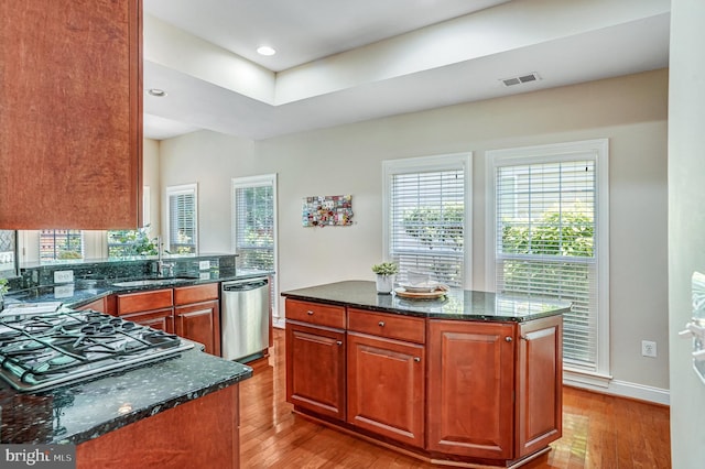 5968 Manorview Way, Alexandria, VA 22315 - kitchen with appliances with stainless steel finishes, light wood-type flooring, dark stone countertops, and recessed lighting