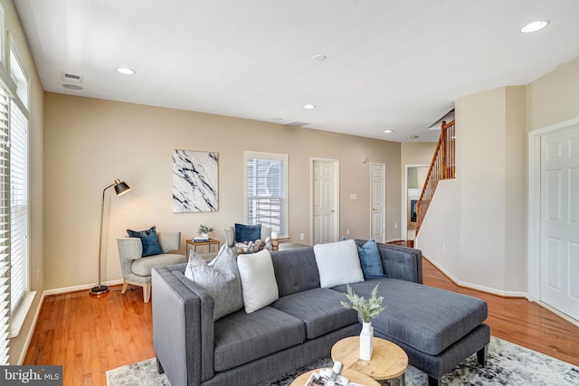 5968 Manorview Way, Alexandria, VA 22315 - living area featuring plenty of natural light, stairway, light wood-style floors, and recessed lighting