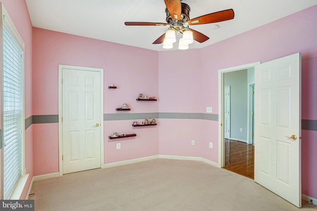 5968 Manorview Way, Alexandria, VA 22315 - unfurnished bedroom featuring carpet floors and a ceiling fan