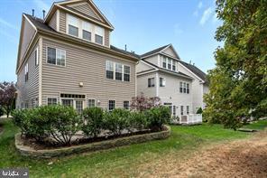 5968 Manorview Way, Alexandria, VA 22315 - rear view of house with a yard