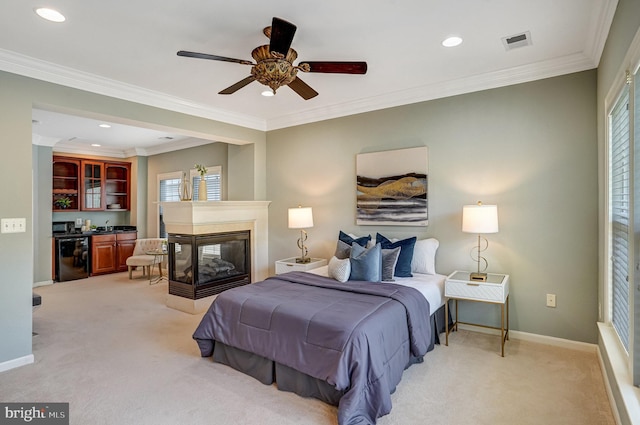 5968 Manorview Way, Alexandria, VA 22315 - bedroom featuring light carpet, a multi sided fireplace, recessed lighting, and ornamental molding