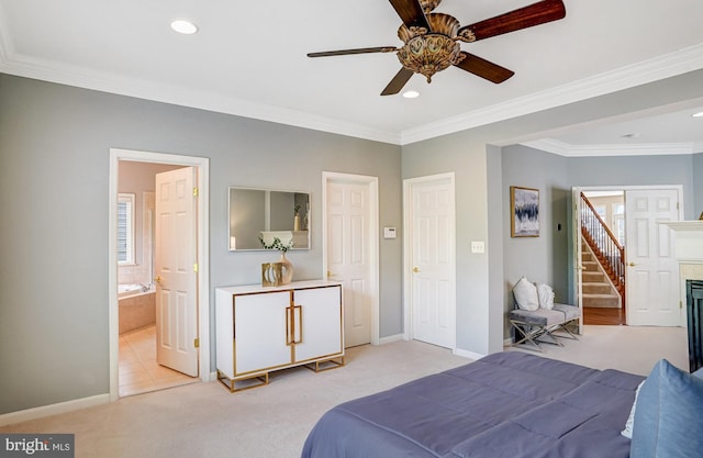 5968 Manorview Way, Alexandria, VA 22315 - bedroom with light carpet, recessed lighting, crown molding, and connected bathroom