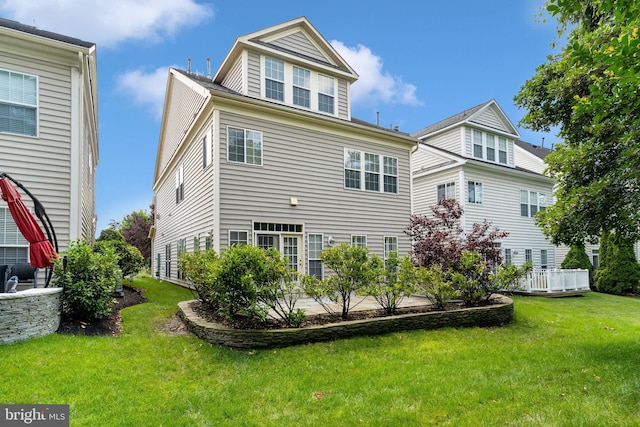 5968 Manorview Way, Alexandria, VA 22315 - rear view of house with a lawn