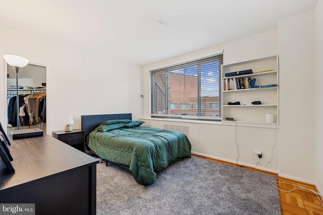 4200 Cathedral Ave NW Unit 1112, Washington, DC 20016 - bedroom with a spacious closet, a closet, and baseboards