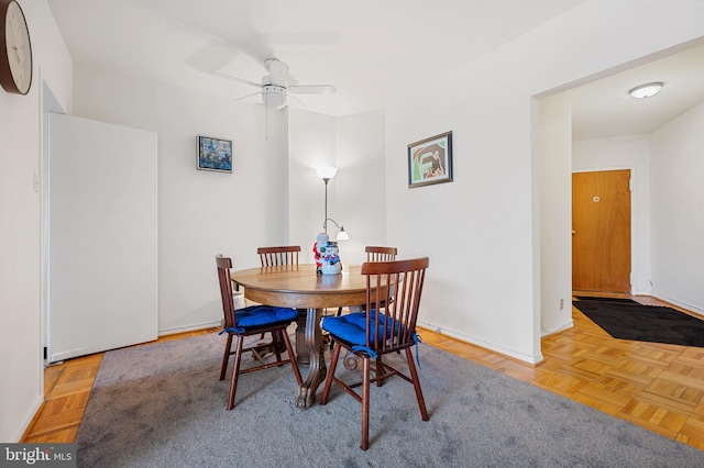 4200 Cathedral Ave NW Unit 1112, Washington, DC 20016 - dining room with ceiling fan and baseboards