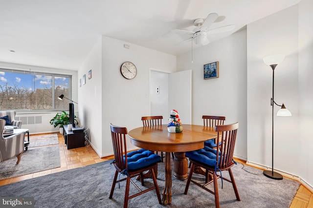 4200 Cathedral Ave NW Unit 1112, Washington, DC 20016 - dining area with a ceiling fan and baseboards