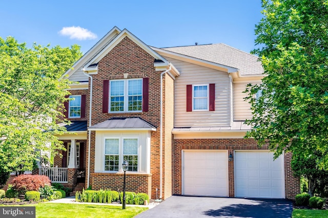 43600 Habitat Cir, Leesburg, VA 20176 - view of front facade with asphalt driveway, a garage, brick siding, and a shingled roof