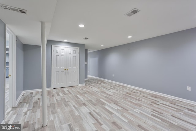 4109 Leisure Dr, Temple Hills, MD 20748 - finished basement with light wood-type flooring, recessed lighting, and baseboards