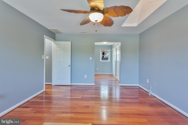 4109 Leisure Dr, Temple Hills, MD 20748 - unfurnished room featuring a ceiling fan, wood finished floors, and baseboards