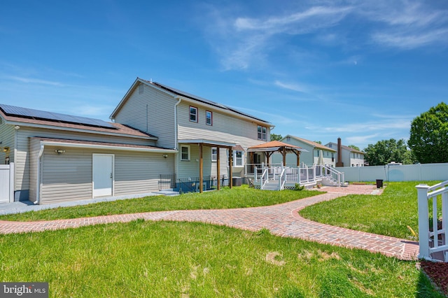 4109 Leisure Dr, Temple Hills, MD 20748 - back of property featuring a gazebo and solar panels