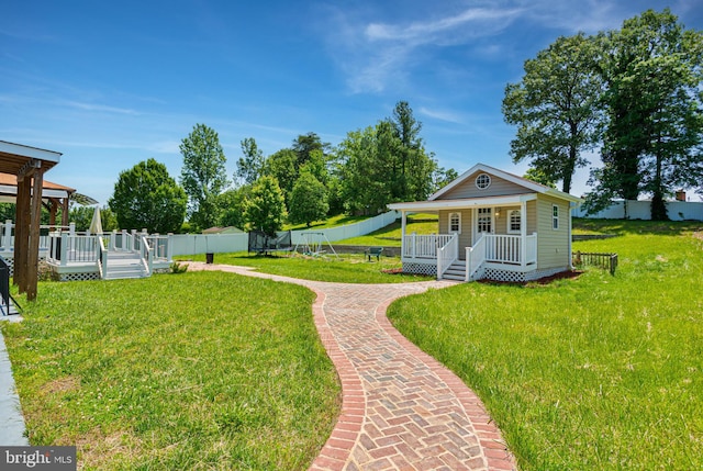 4109 Leisure Dr, Temple Hills, MD 20748 - view of yard featuring covered porch and a wooden deck