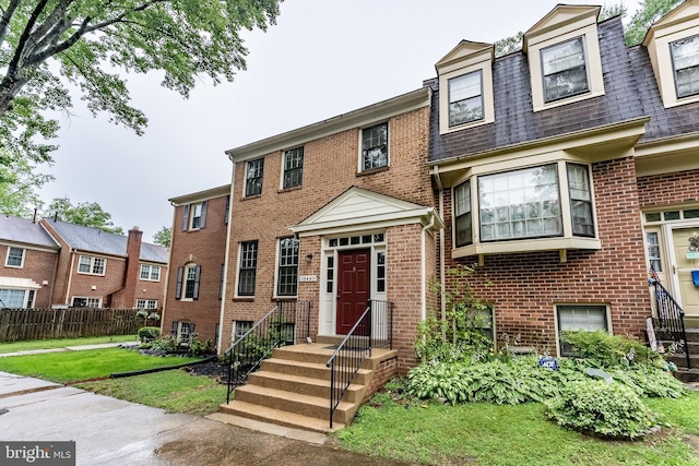 10447 Carriagepark Ct, Fairfax, VA 22032 - townhome / multi-family property featuring brick siding and roof with shingles