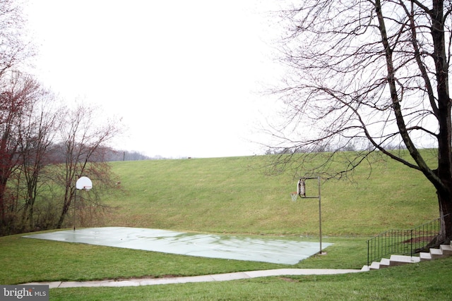 10447 Carriagepark Ct, Fairfax, VA 22032 - view of basketball court with a lawn and community basketball court