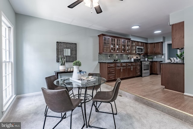10447 Carriagepark Ct, Fairfax, VA 22032 - dining space featuring a ceiling fan and light wood finished floors