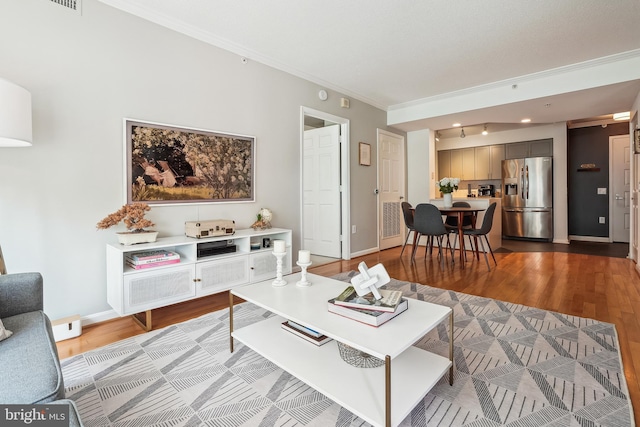 3101 N Hampton Dr Unit 314, Alexandria, VA 22302 - living area featuring wood finished floors, crown molding, and baseboards