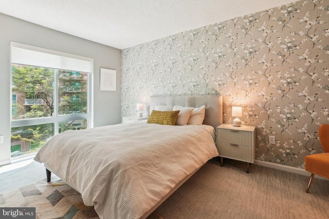 3101 N Hampton Dr Unit 314, Alexandria, VA 22302 - bedroom with wallpapered walls, carpet floors, and baseboards