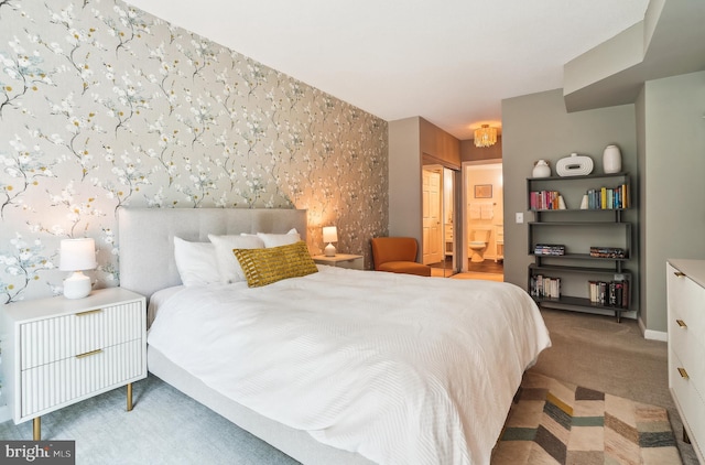 3101 N Hampton Dr Unit 314, Alexandria, VA 22302 - bedroom with an accent wall, wallpapered walls, carpet floors, connected bathroom, and baseboards