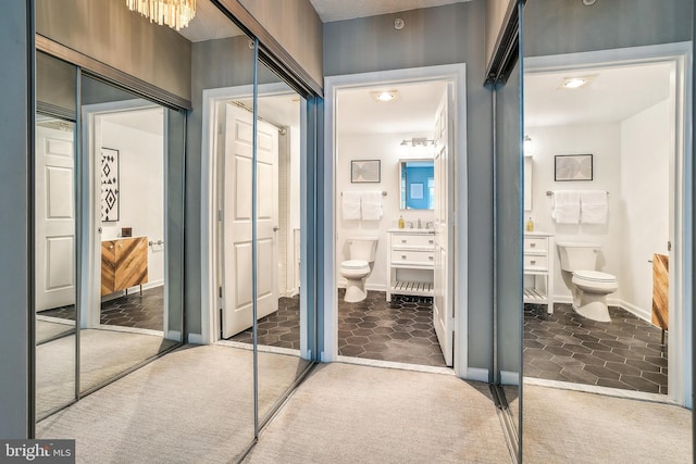 3101 N Hampton Dr Unit 314, Alexandria, VA 22302 - bathroom with toilet, vanity, and baseboards
