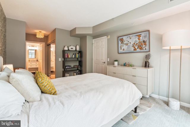 3101 N Hampton Dr Unit 314, Alexandria, VA 22302 - bedroom featuring light colored carpet, ensuite bath, and baseboards