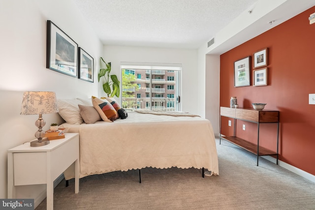 3101 N Hampton Dr Unit 314, Alexandria, VA 22302 - bedroom featuring carpet and a textured ceiling