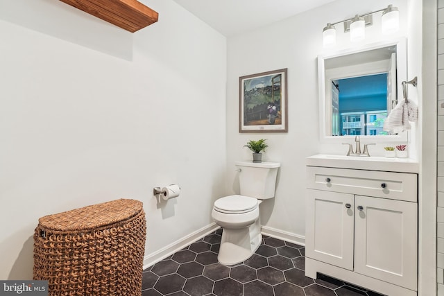 3101 N Hampton Dr Unit 314, Alexandria, VA 22302 - bathroom with toilet, vanity, tile patterned flooring, and baseboards