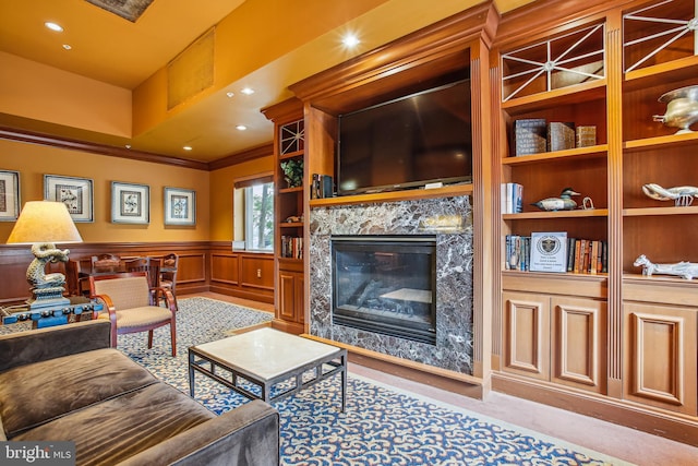 3101 N Hampton Dr Unit 314, Alexandria, VA 22302 - living area featuring a high end fireplace, ornamental molding, wainscoting, and built in shelves