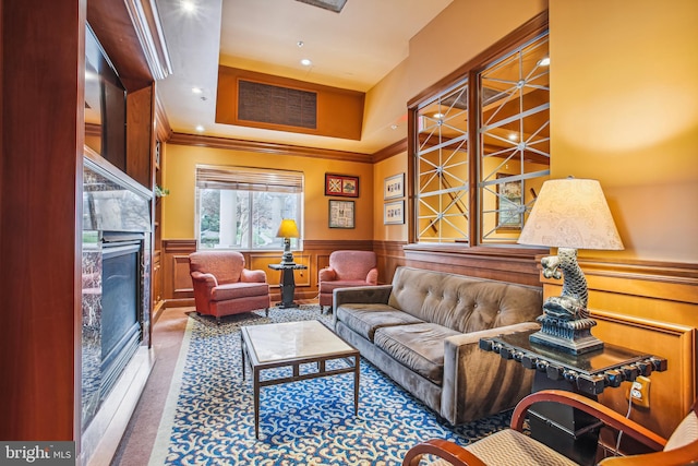 3101 N Hampton Dr Unit 314, Alexandria, VA 22302 - living room featuring a wainscoted wall, crown molding, a fireplace, and carpet flooring