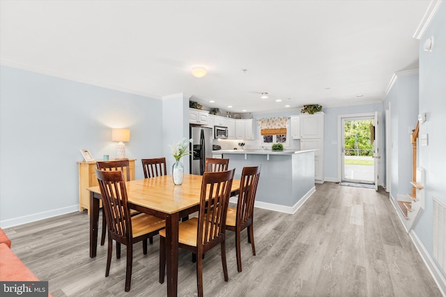 9729 Village Ln Unit 9715C, Ocean City, MD 21842 - dining room featuring crown molding, light wood-style floors, baseboards, and recessed lighting