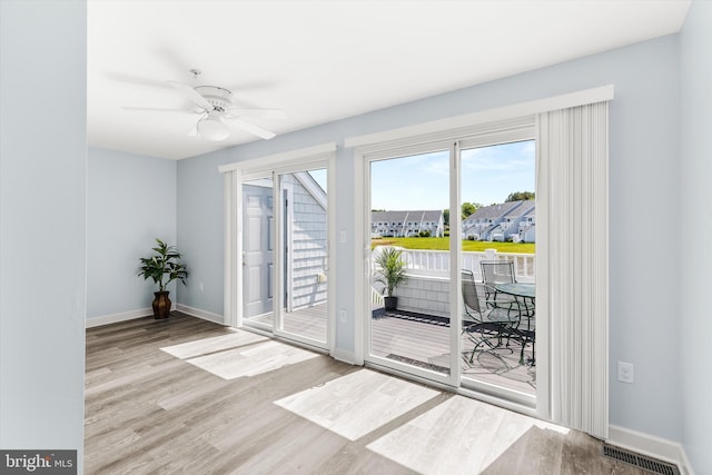 9729 Village Ln Unit 9715C, Ocean City, MD 21842 - entryway featuring wood finished floors, baseboards, and a ceiling fan